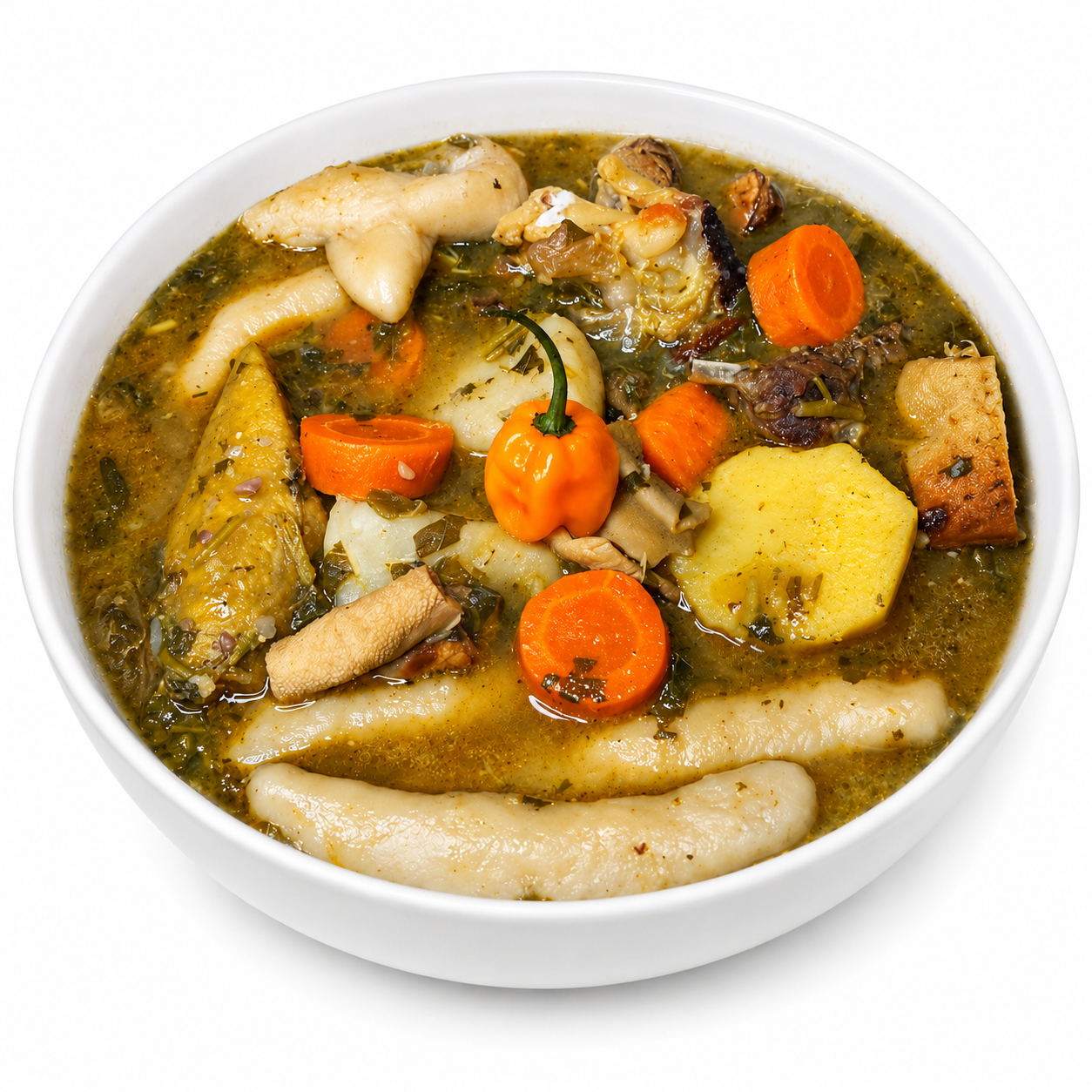 Bowl of Haitian bouyon kabrit goat stew with dumplings, carrots, and scotch bonnet pepper